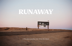 'Runaway' zine cover featuring a full-page photo of an abandoned billboard in the desert at dusk. The title is present along with the caption, 'a film photography zine about the desert'.